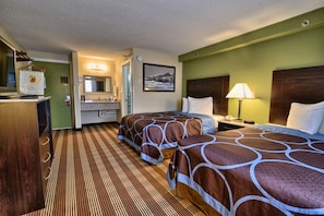 Pillow-top beds, desk, blackout curtains, cots/infant beds