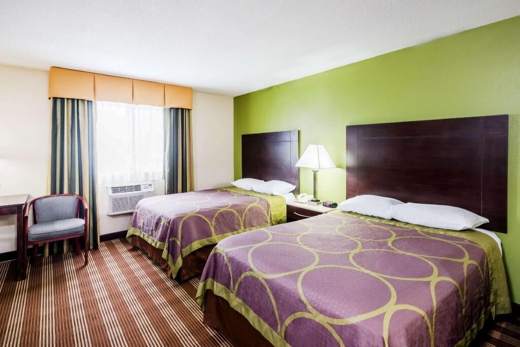 Pillow-top beds, desk, blackout curtains, cots/infant beds