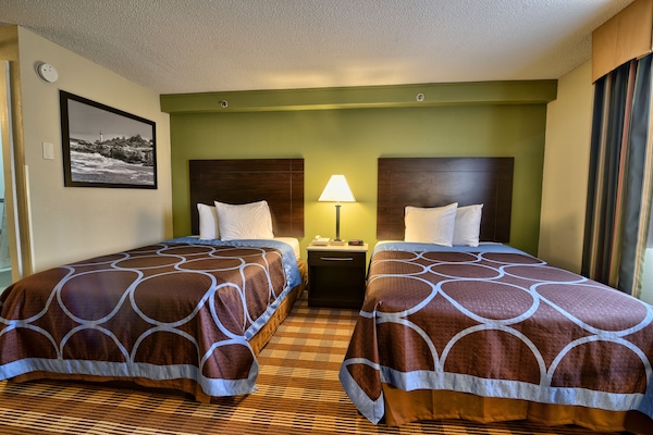 Pillowtop beds, desk, blackout drapes, cribs/infant beds