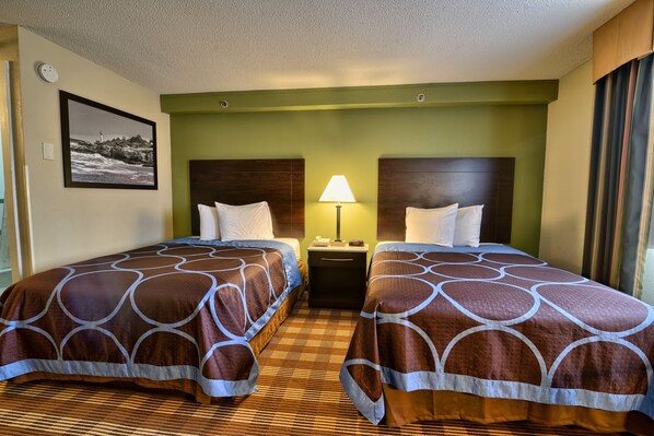 Pillow-top beds, desk, blackout curtains, cots/infant beds