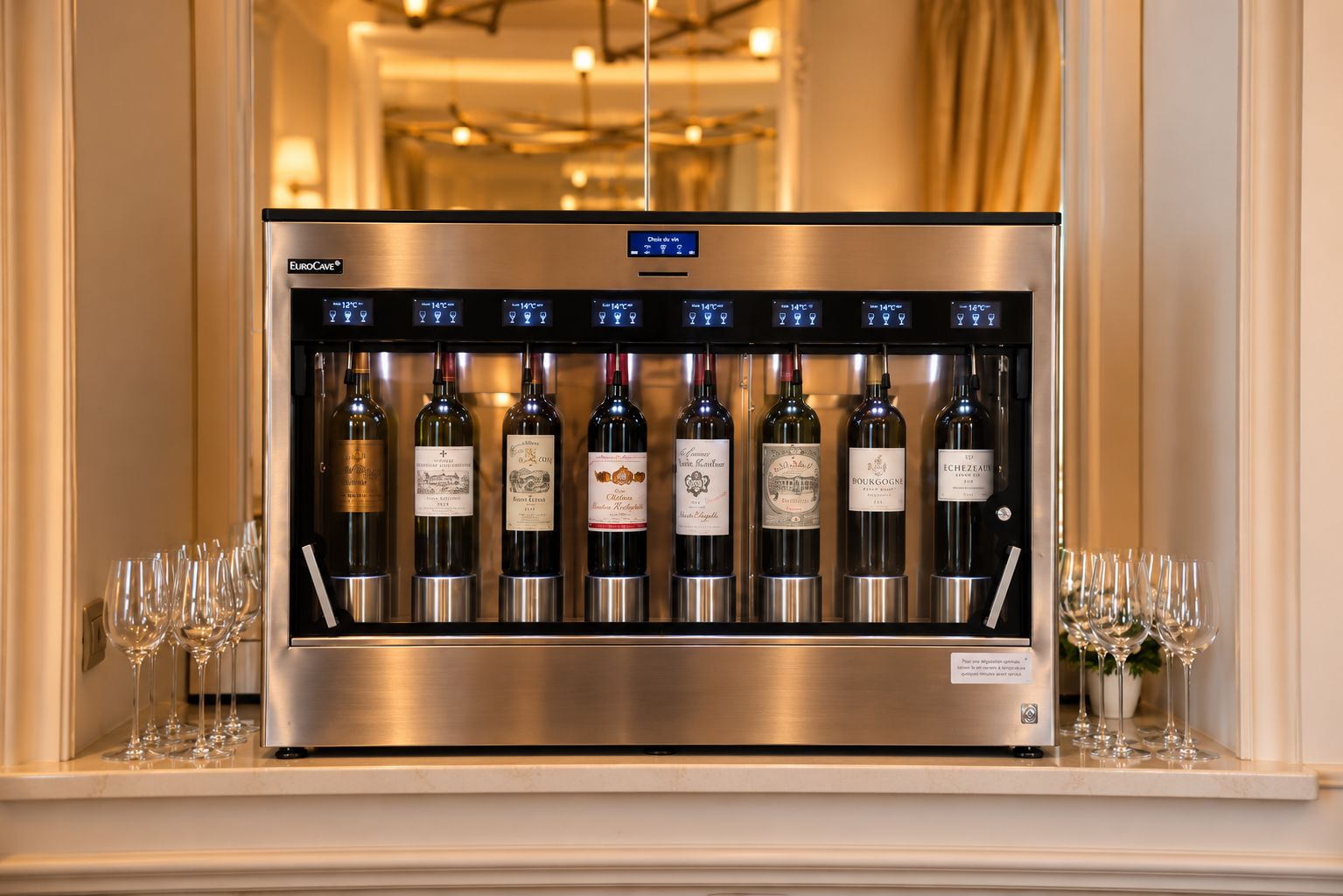 A EuroCave wine cooler with multiple wine bottles and glasses.