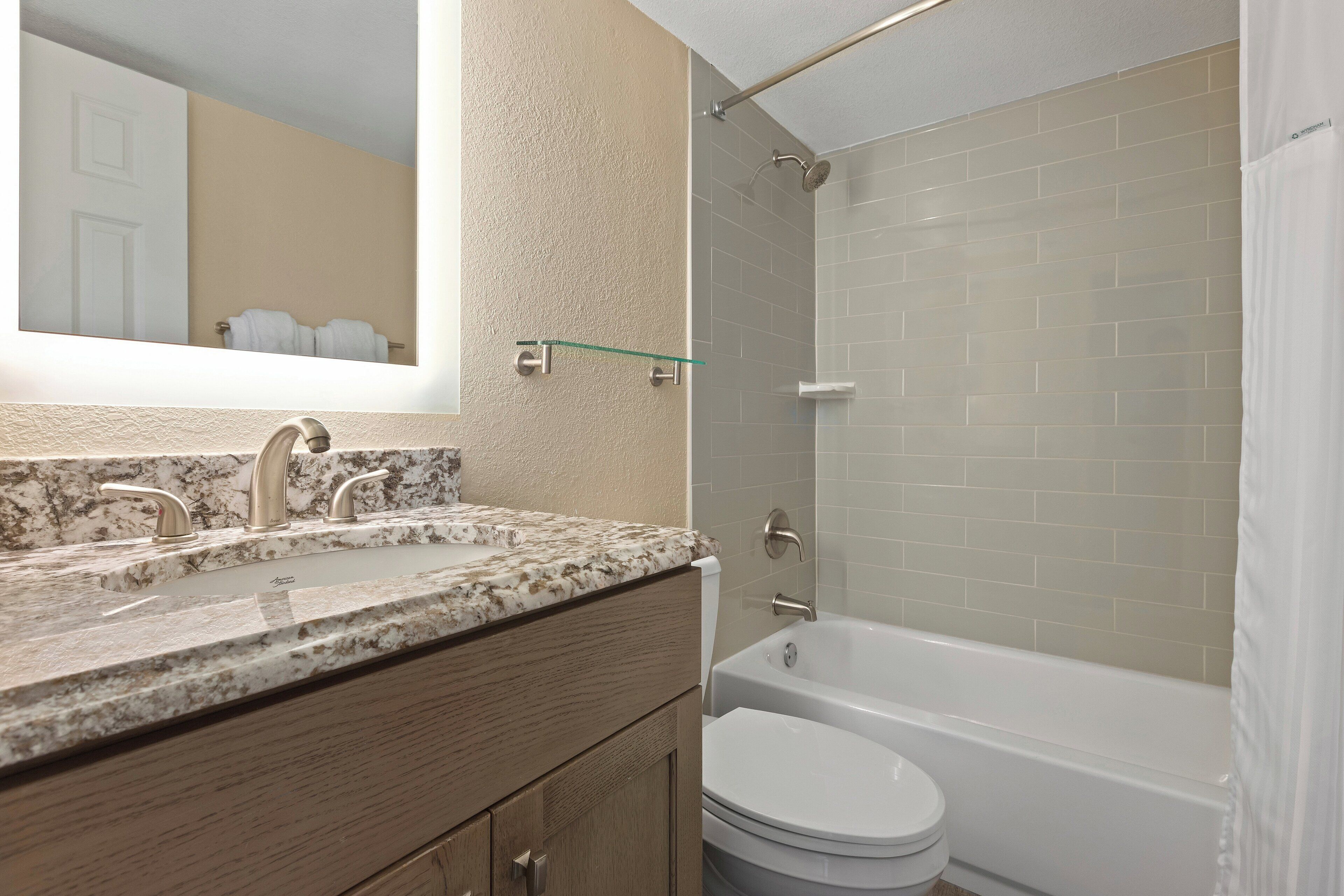 standard condo, 2 bedrooms, non smoking | bathroom | combined shower/bathtub, free toiletries, hair dryer, towels
