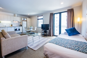 Deluxe Room, 1 Bedroom | Living area