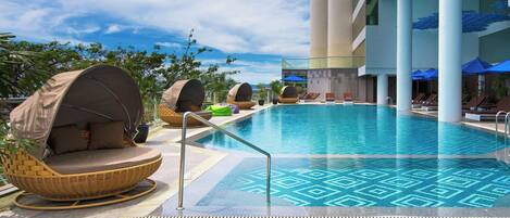 Outdoor pool, open 6:00 AM to 9:00 PM, pool umbrellas, sun loungers