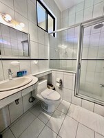 Deluxe Triple Room, 1 Bedroom, Balcony, Pool View | Bathroom | Shower, free toiletries, hair dryer, towels
