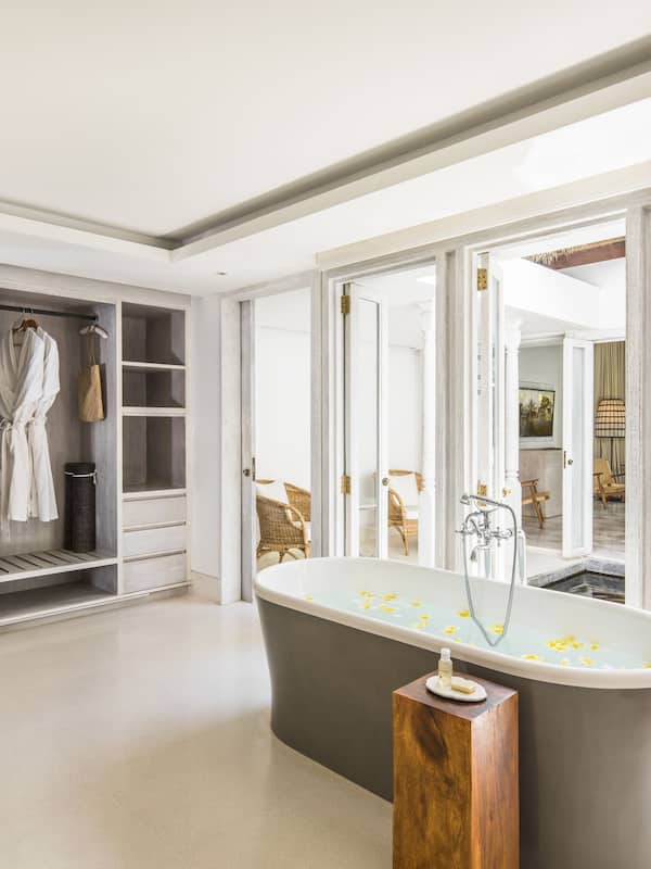 Separate tub and shower, deep soaking tub, designer toiletries