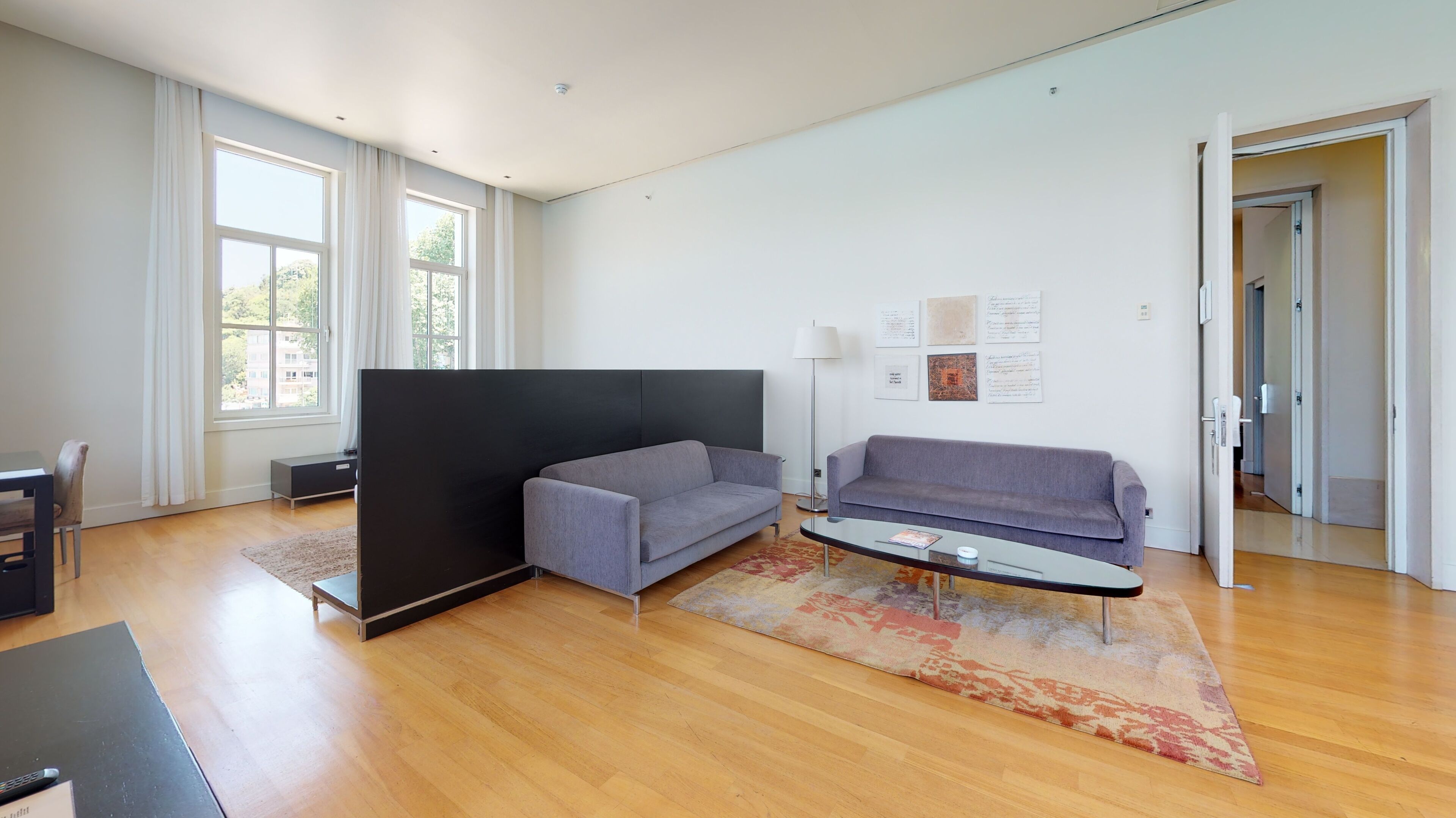 deluxe suite | living area | 42-cm lcd tv with cable channels, tv, heated floors