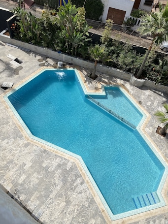 Outdoor pool, sun loungers