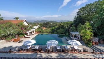 Outdoor pool, pool umbrellas, pool loungers