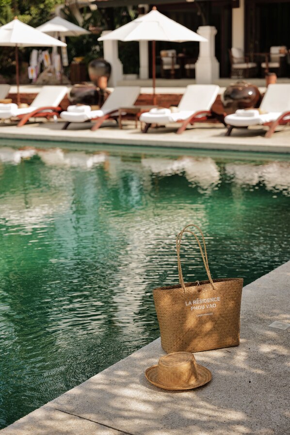 Outdoor pool, pool umbrellas, sun loungers