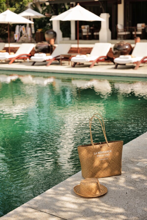 Outdoor pool, pool umbrellas, sun loungers
