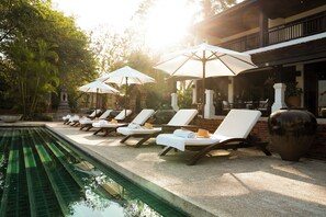 Outdoor pool, free pool cabanas, pool umbrellas