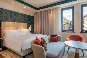 Premium bedding, down duvets, minibar, in-room safe