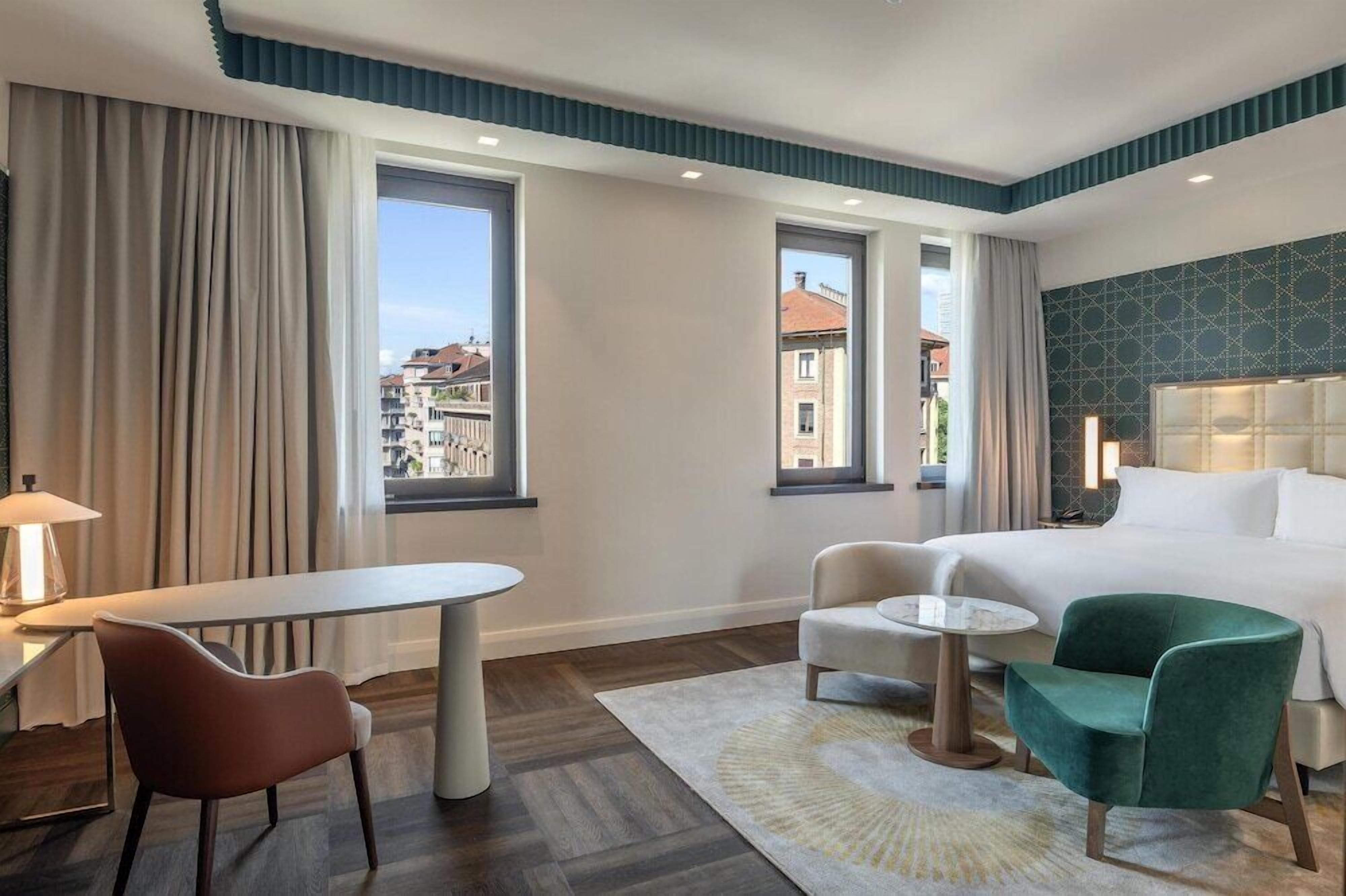 Premium bedding, down comforters, minibar, in-room safe