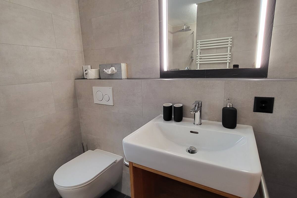 hair dryer, bathrobes, towels