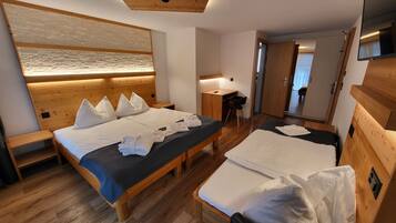 Basic Triple Room, Balcony | In-room safe, free WiFi, bed sheets