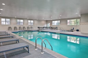 Indoor pool, open 8:00 AM to 9:00 PM, pool loungers