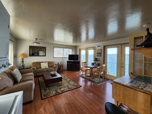 Waterfront Condo Upper (No Pets Allowed) | Living area | 32-inch flat-screen TV with cable channels, TV