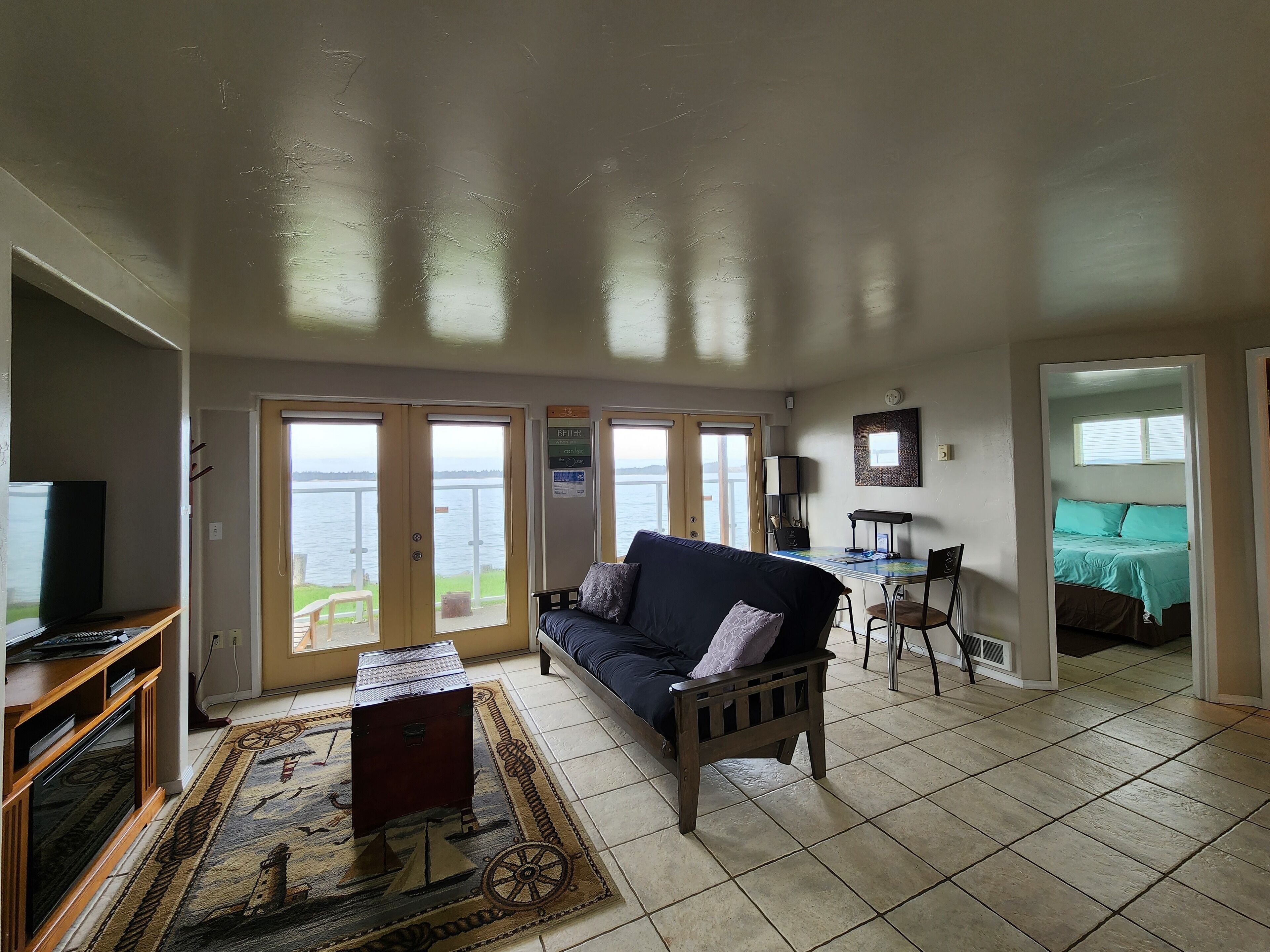 Condo | Living area | 32-inch flat-screen TV with cable channels, TV