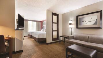 Room, Multiple Beds | Down comforters, in-room safe, desk, blackout drapes