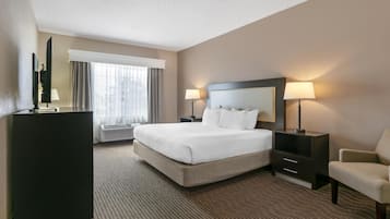 Hypo-allergenic bedding, desk, laptop workspace, blackout curtains