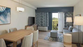 Suite, 1 Bedroom, Balcony | Living room | 32-inch Smart TV with satellite channels, TV, Netflix
