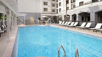 Outdoor pool, open 7:00 AM to 10:00 PM, pool umbrellas, sun loungers