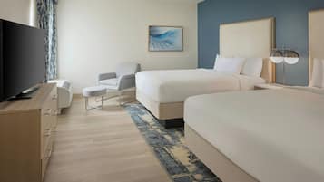 Premium bedding, desk, laptop workspace, blackout drapes