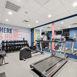 A gym with treadmills, dumbbells, and a motivational wall. - Hampton Inn Martinsburg South-Inwood (Inwood)