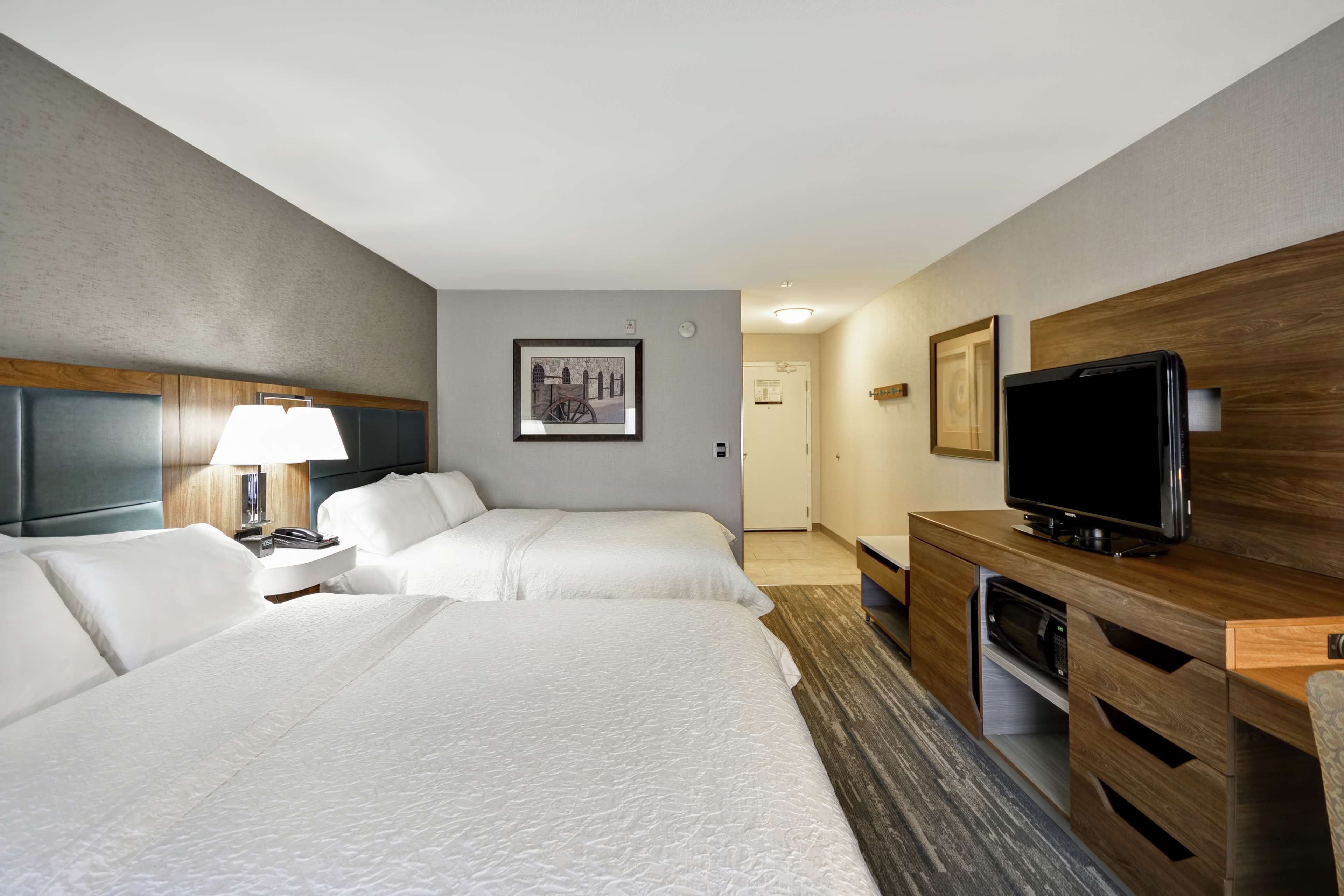 two queen beds non smoking | premium bedding, desk, laptop workspace, blackout curtains