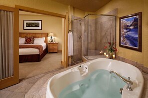 Separate tub and shower, jetted tub, designer toiletries, hair dryer
