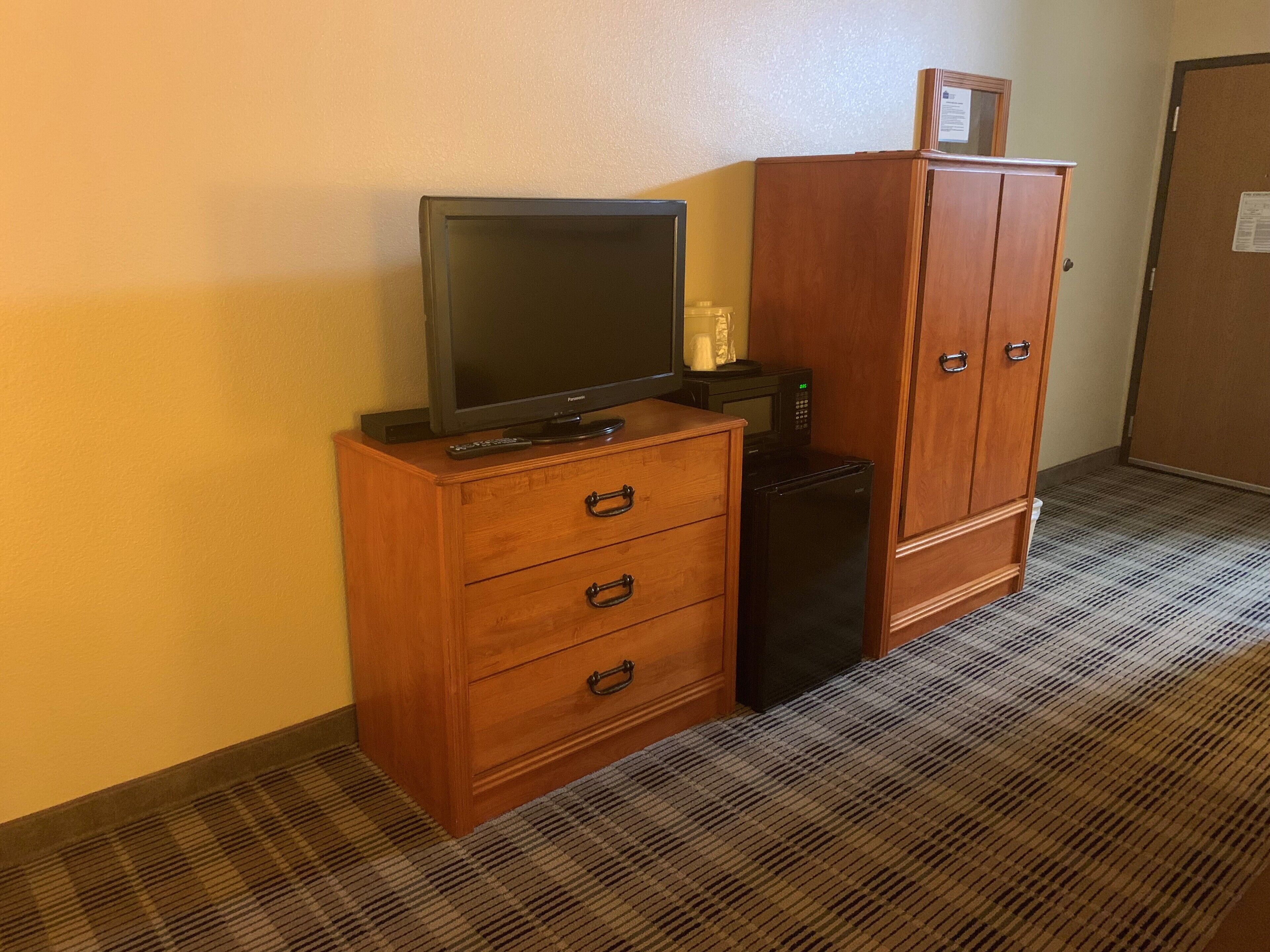 desk, blackout curtains, iron/ironing board, rollaway beds