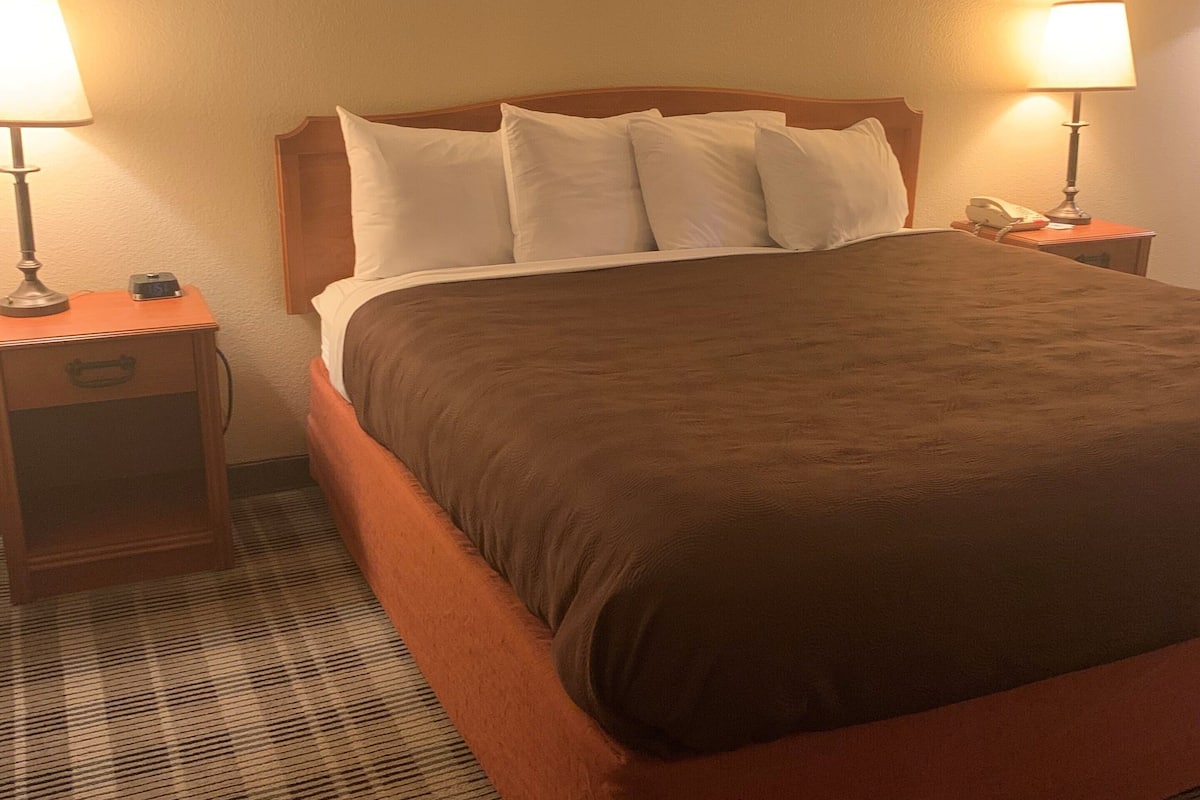 desk, blackout curtains, iron/ironing board, rollaway beds