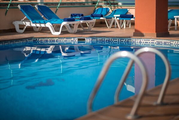 Outdoor pool, pool umbrellas, pool loungers