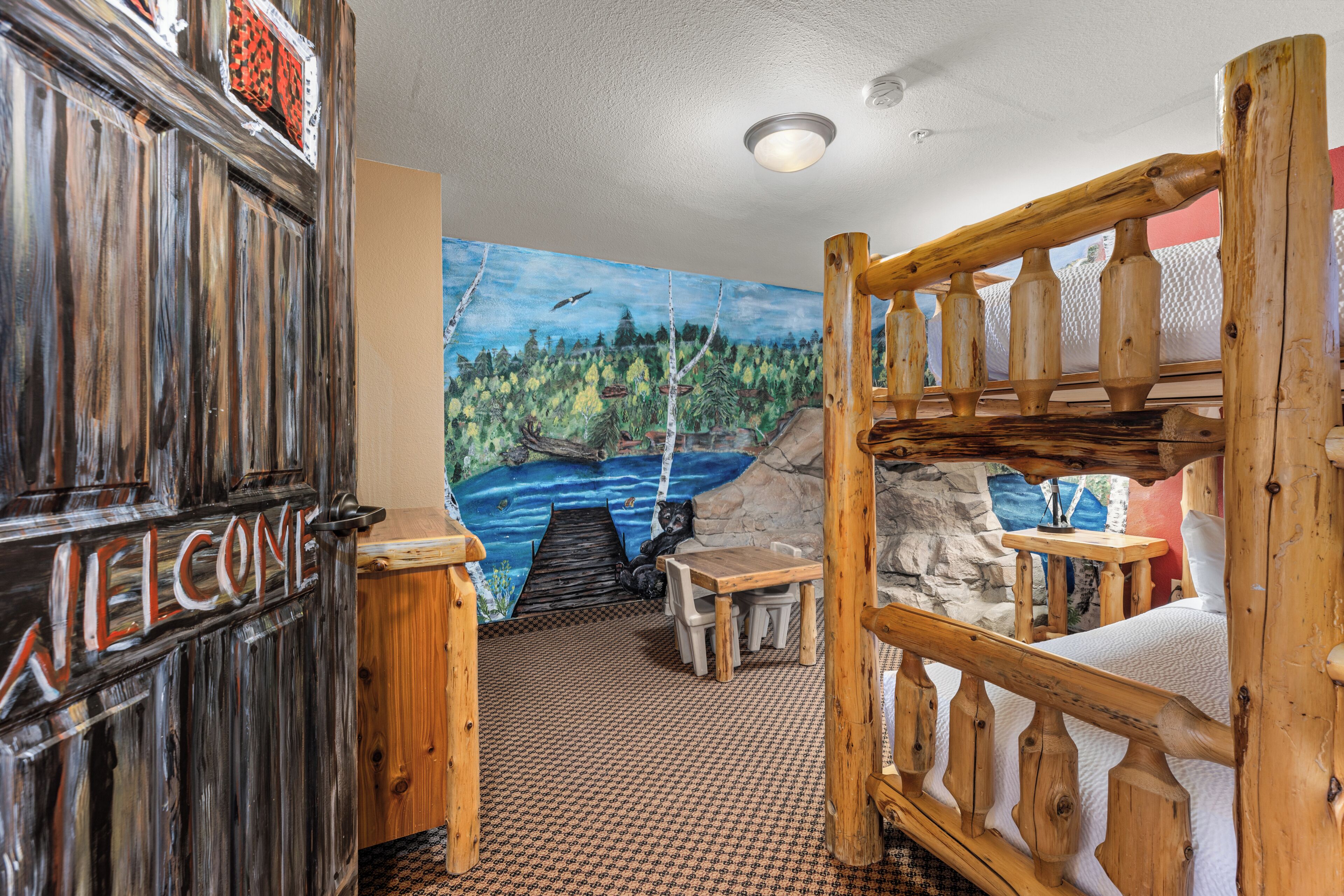 1 King Bed, 1 Queen & 1 Double Bunk Bed, Family Suite, Non-Smoking | Iron/ironing board, cots/infant beds, bed sheets
