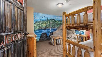 1 King Bed, 1 Queen & 1 Double Bunk Bed, Family Suite, Non-Smoking | Iron/ironing board, cots/infant beds, bed sheets