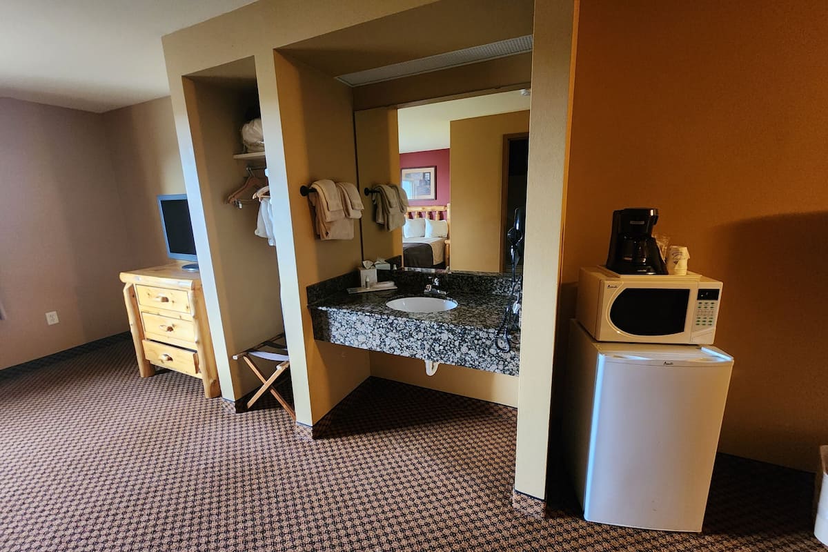 room, 2 queen beds (split) | in-room safe, iron/ironing board, free cots/infant beds, rollaway beds