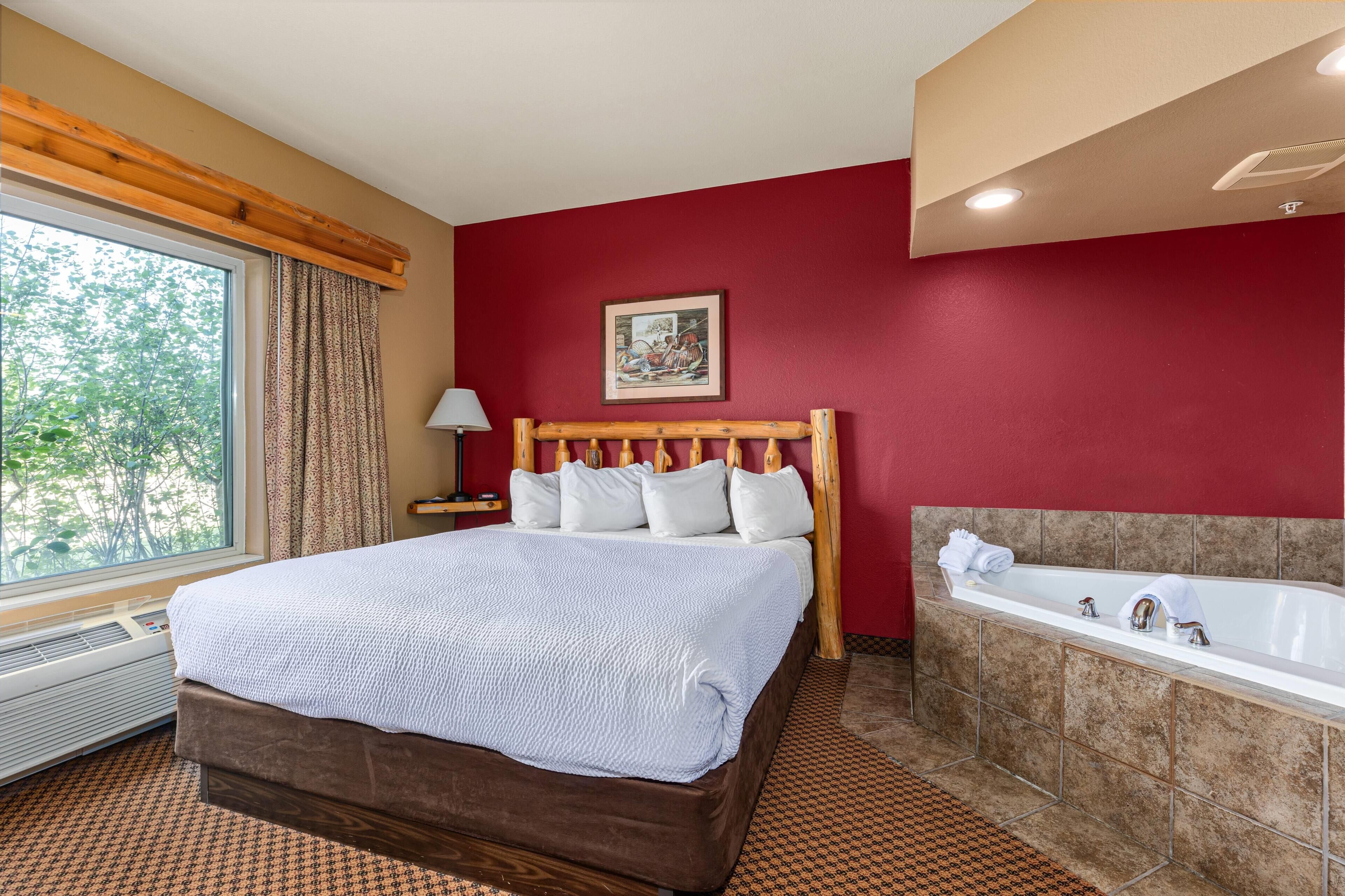 Suite, 1 King Bed, Non Smoking, Jetted Tub | In-room safe, iron/ironing board, cribs/infant beds, free WiFi