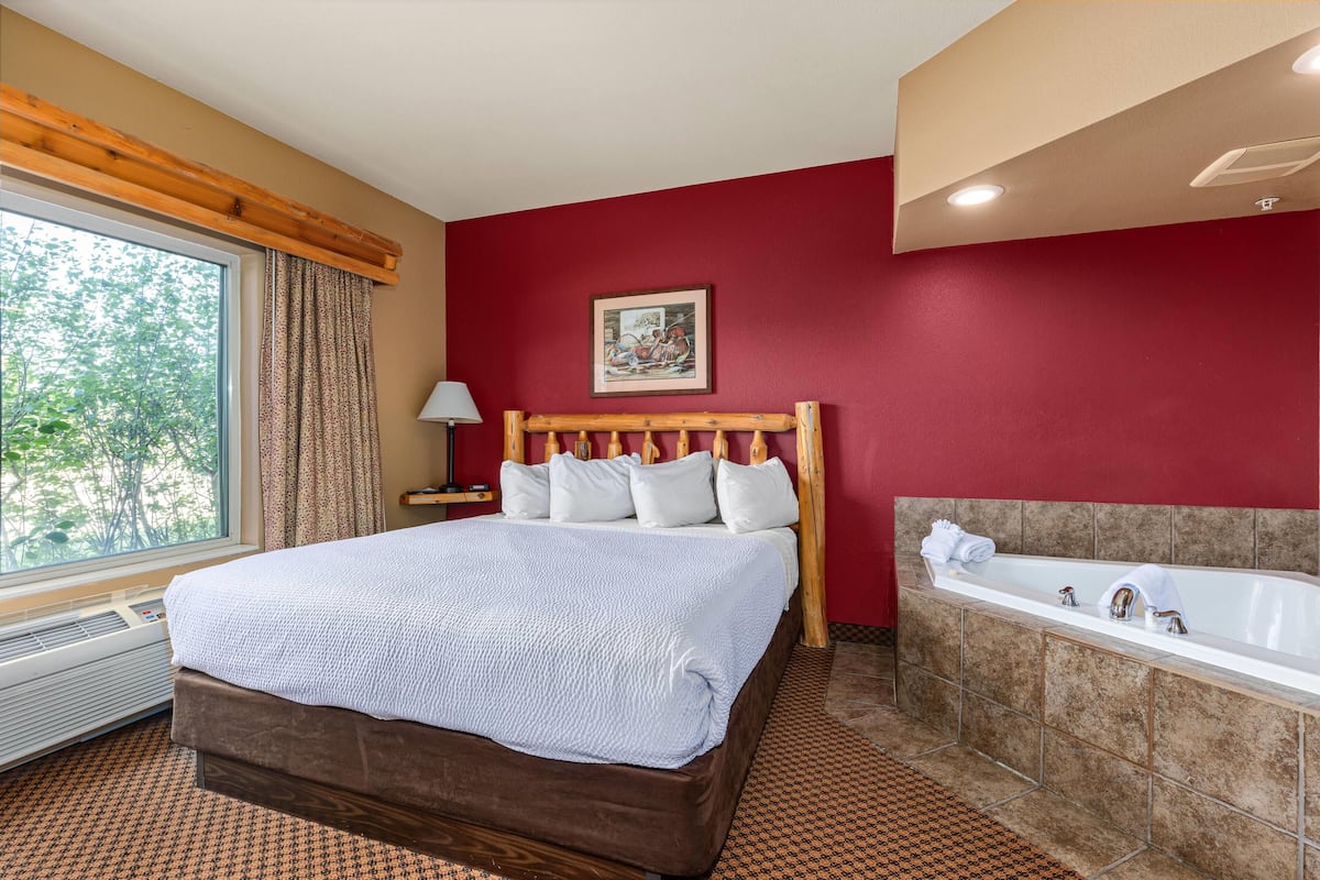 Suite, 1 King Bed, Non Smoking, Jetted Tub | In-room safe, iron/ironing board, cribs/infant beds, free WiFi