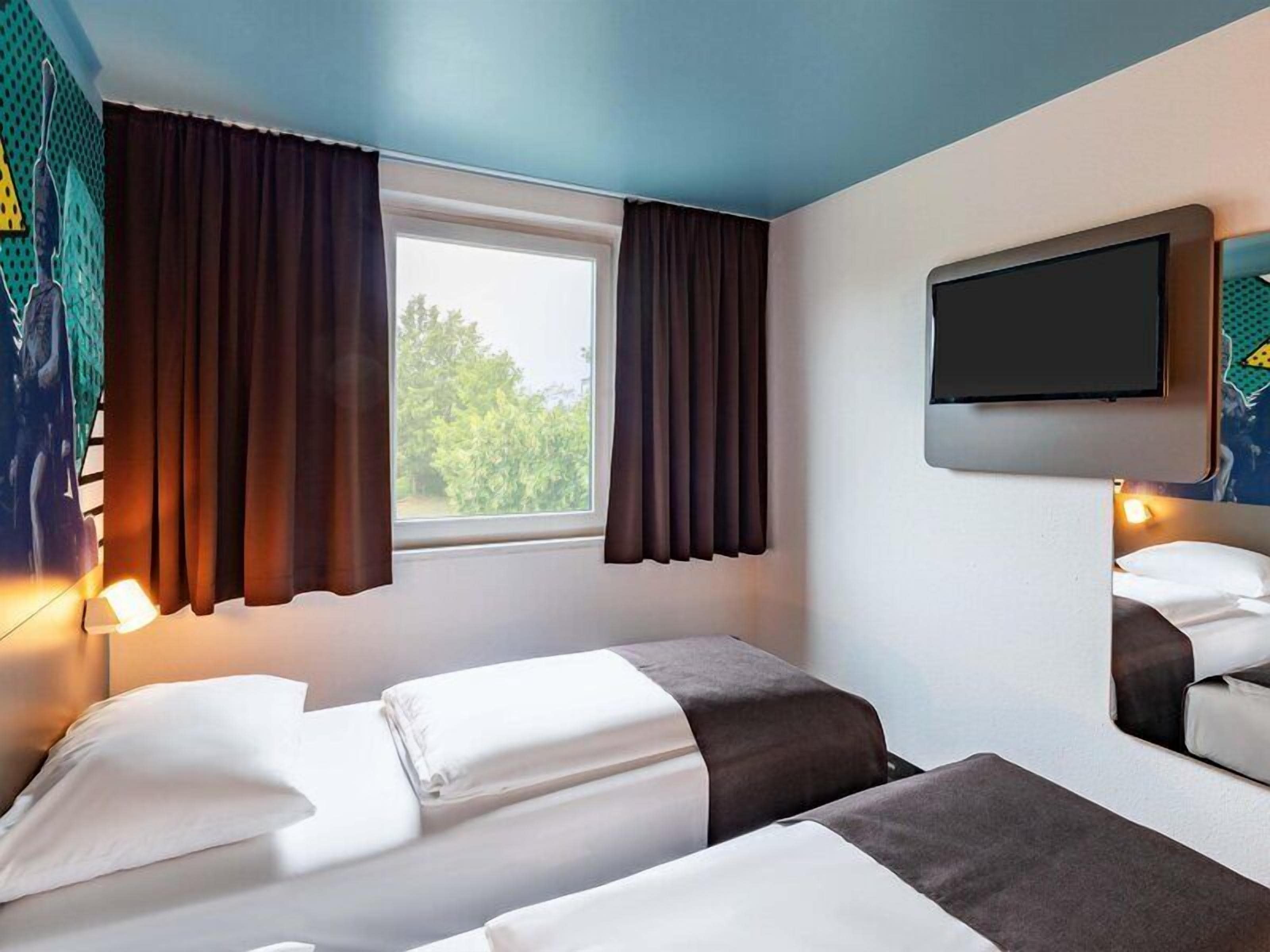 Habitación con 2 camas individuales | Escritorio, insonorización, wifi gratis y ropa de cama 