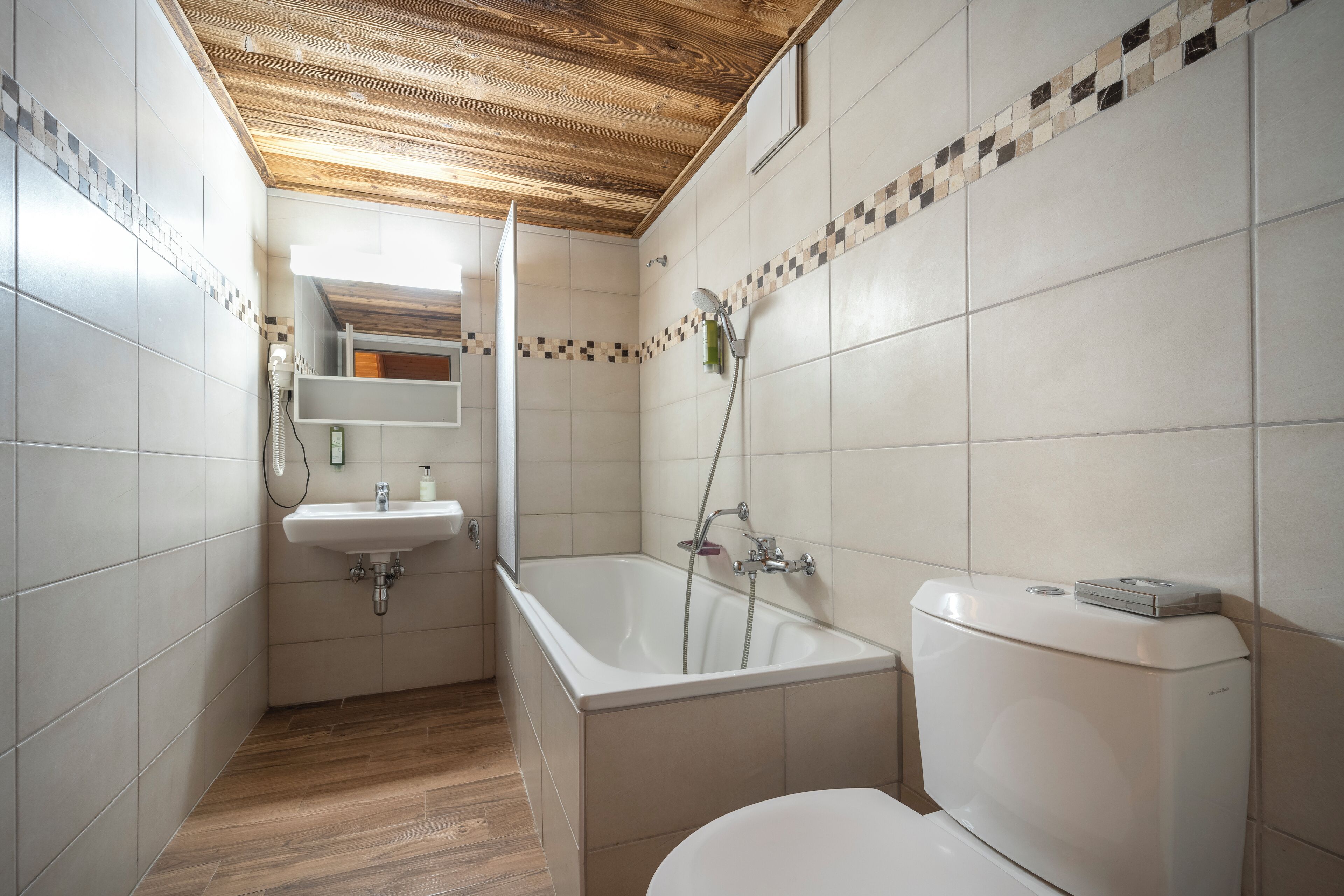 family suite, 1 bedroom, non smoking, mountain view | bathroom | shower, hair dryer, towels, soap