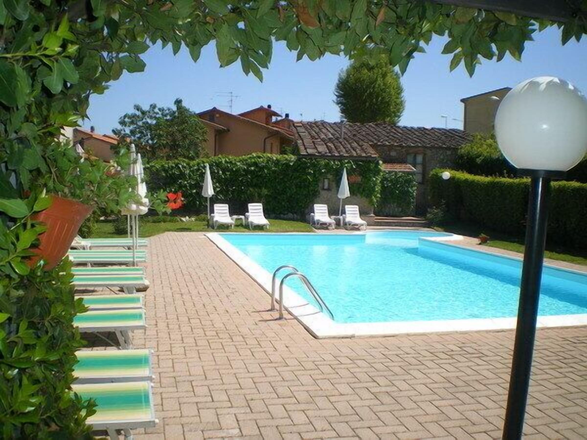 Seasonal outdoor pool, pool umbrellas, sun loungers