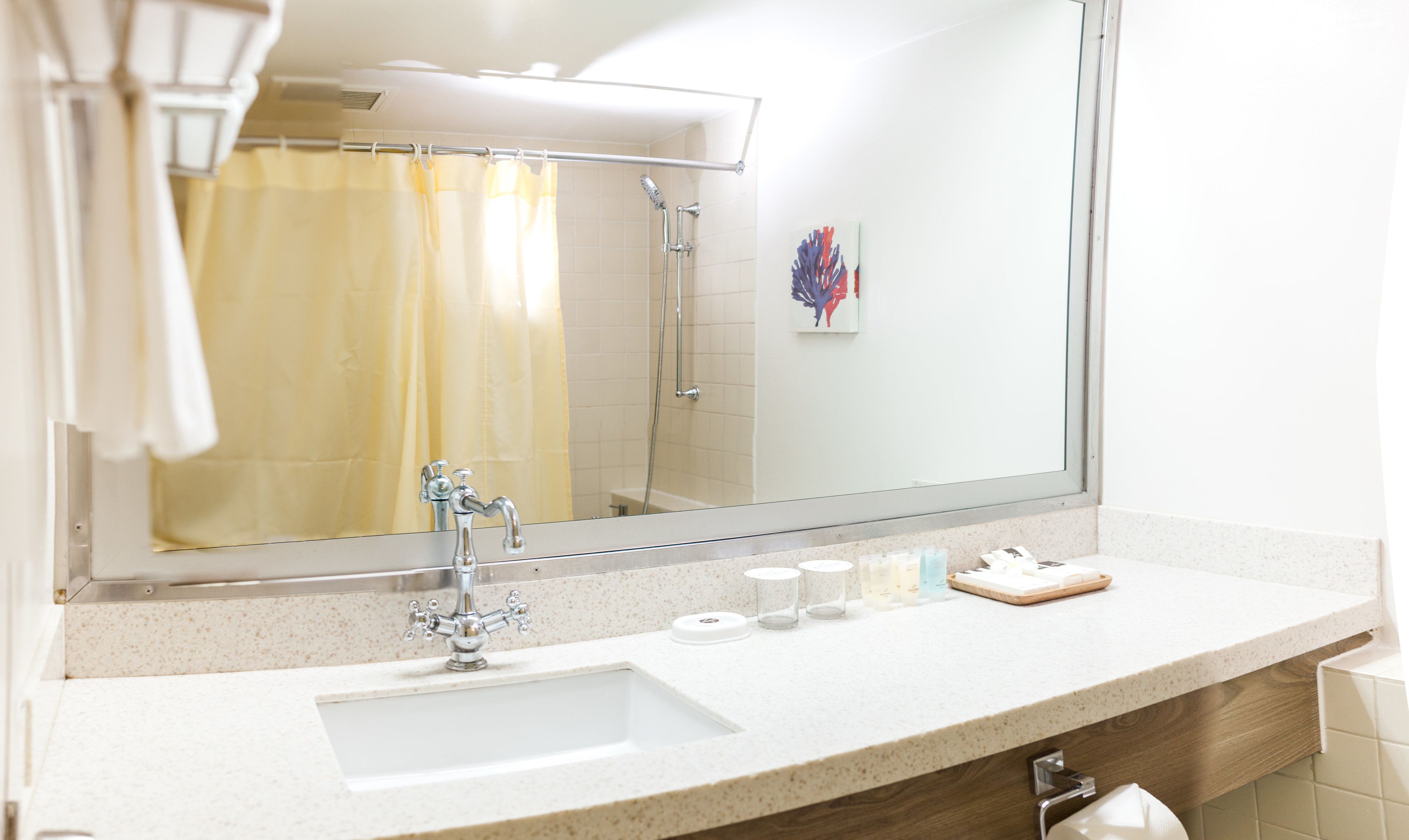 combined shower/bathtub, free toiletries, hair dryer, slippers