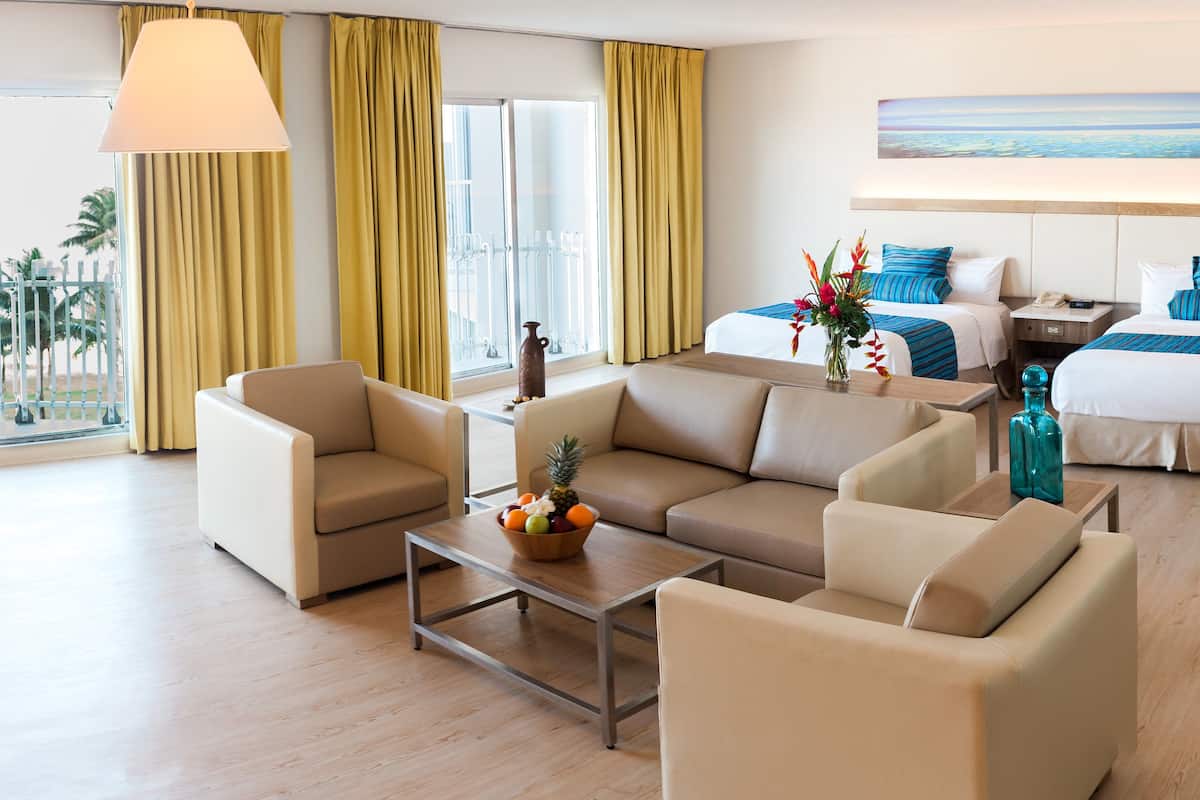 family room | in-room safe, desk, blackout curtains, soundproofing