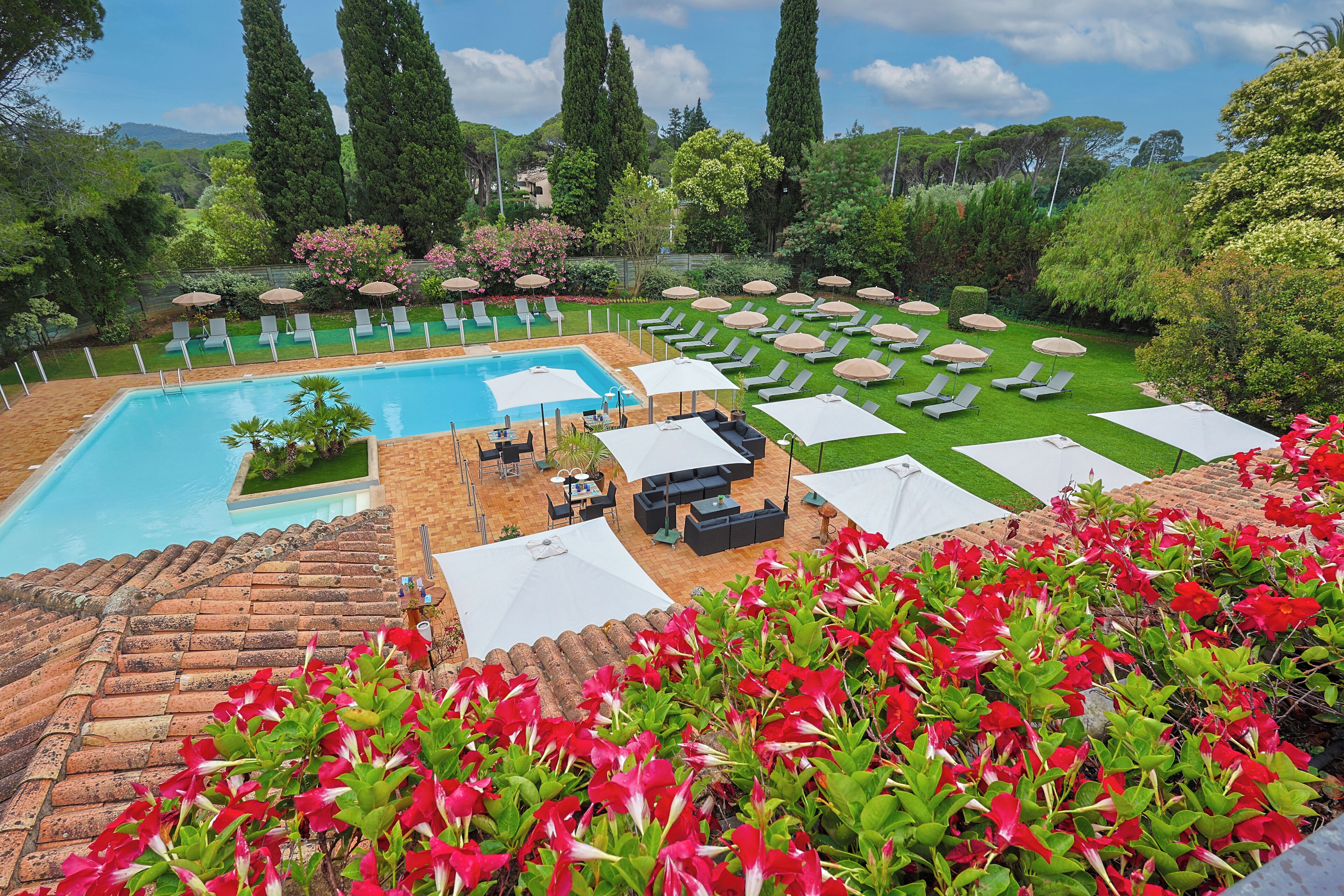 Seasonal outdoor pool, open 8:00 AM to 8:00 PM, pool umbrellas