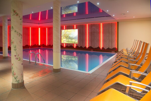 Indoor pool, open 7 AM to 9 PM, pool loungers