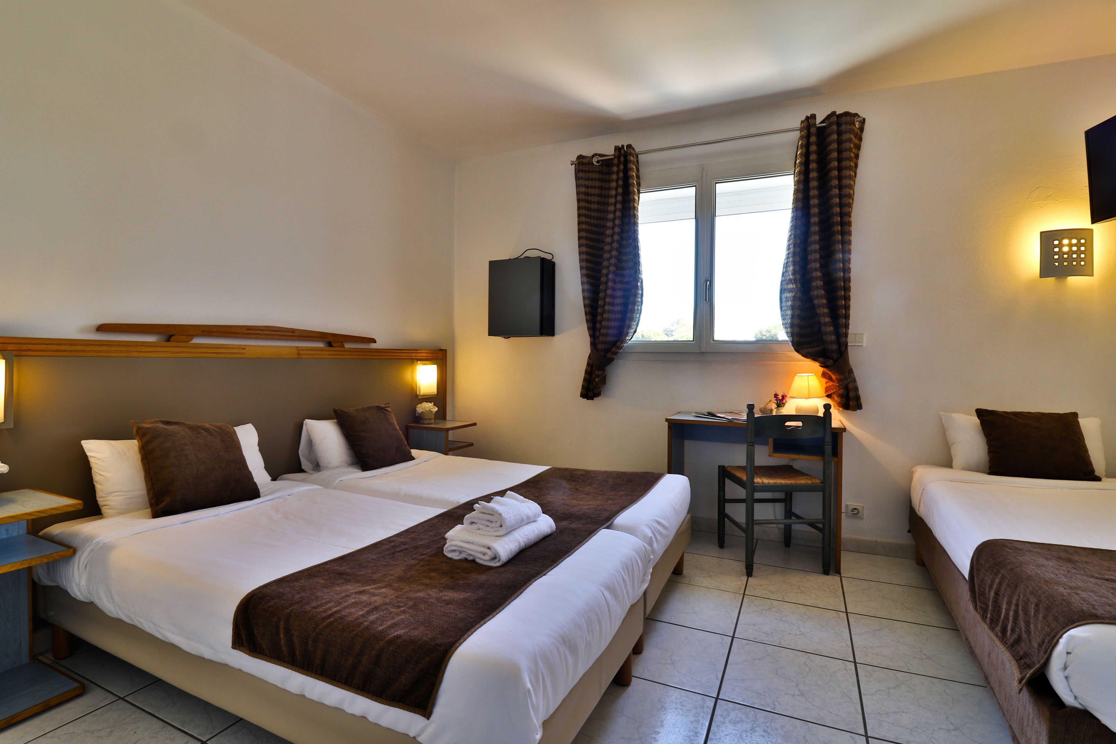 Select Comfort beds, minibar, in-room safe, desk