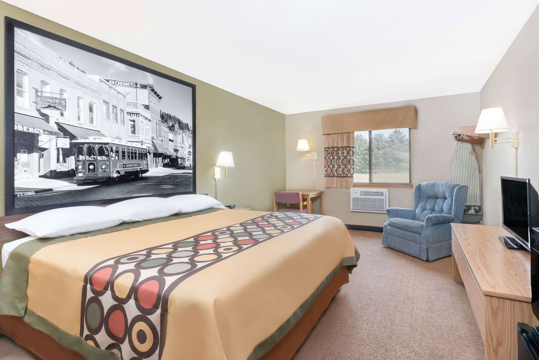 Blackout drapes, iron/ironing board, free cribs/infant beds