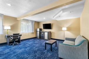 Suite, 1 King Bed, Non Smoking | Desk, laptop workspace, iron/ironing board, free cribs/infant beds