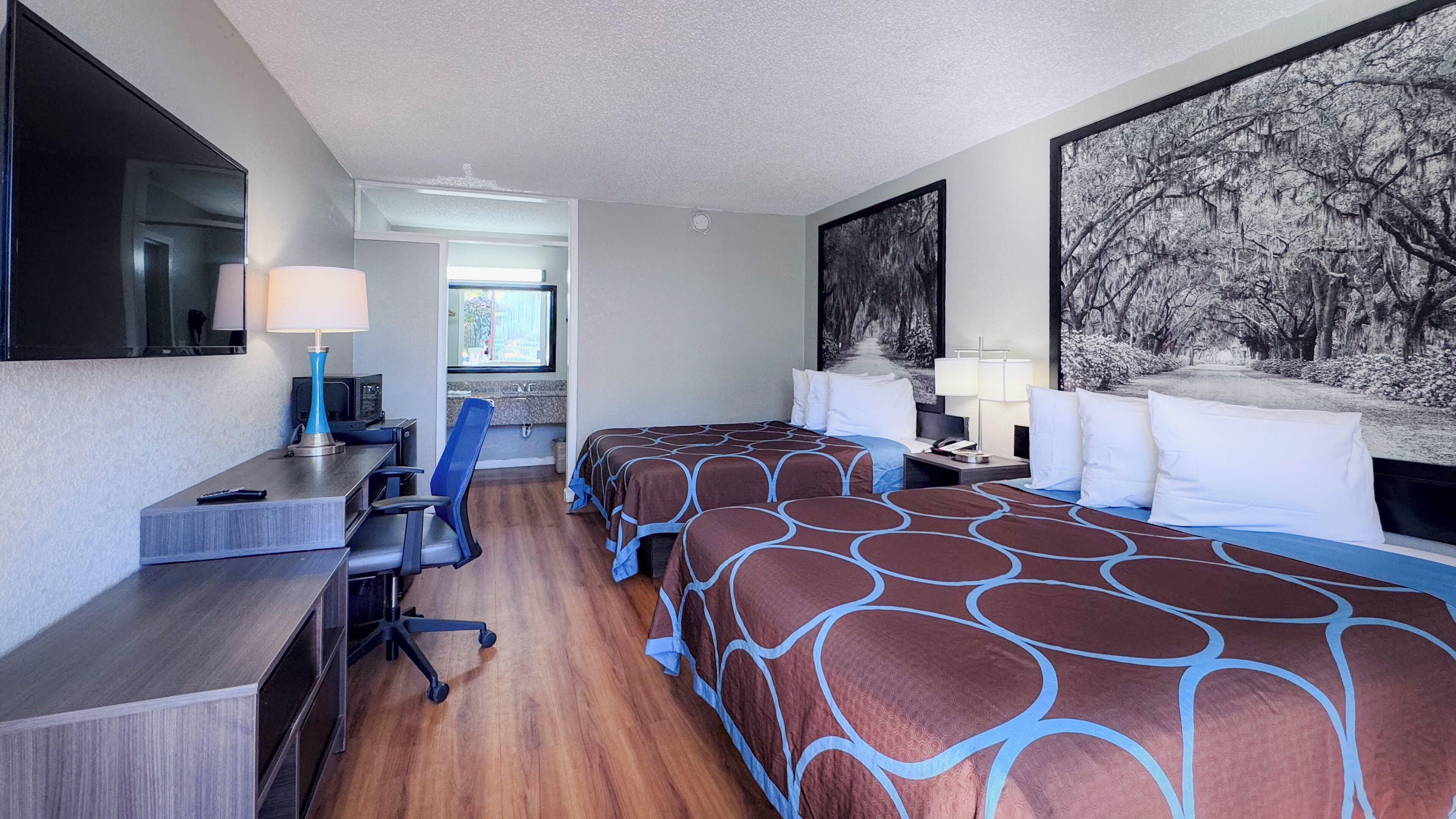 Pillowtop beds, desk, blackout drapes, iron/ironing board